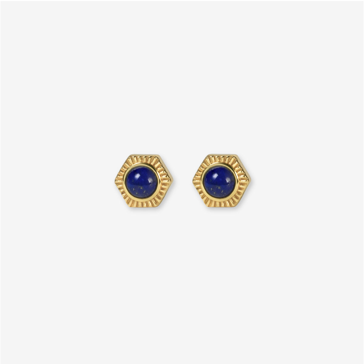 Make a bold statement with BY TONIN Belle Viv gold hexagonal stud earrings, featuring captivating deep blue lapis lazuli inlays for striking sophistication