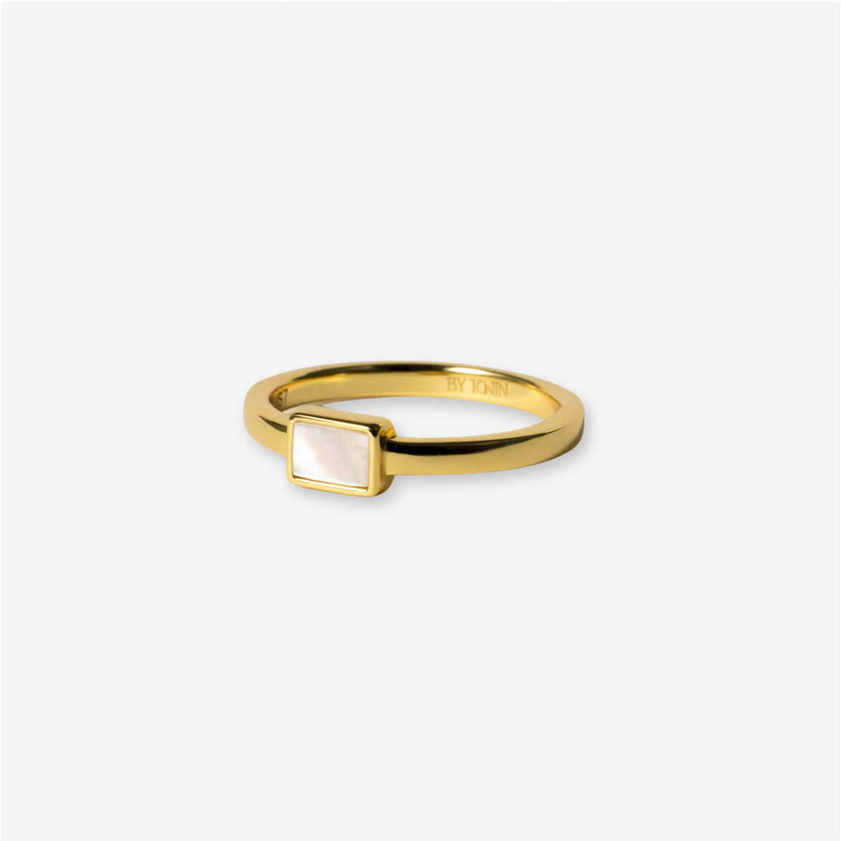 BY TONIN's Heritage gold ring featuring a rectangular mother of pearl centerpiece on white background.
