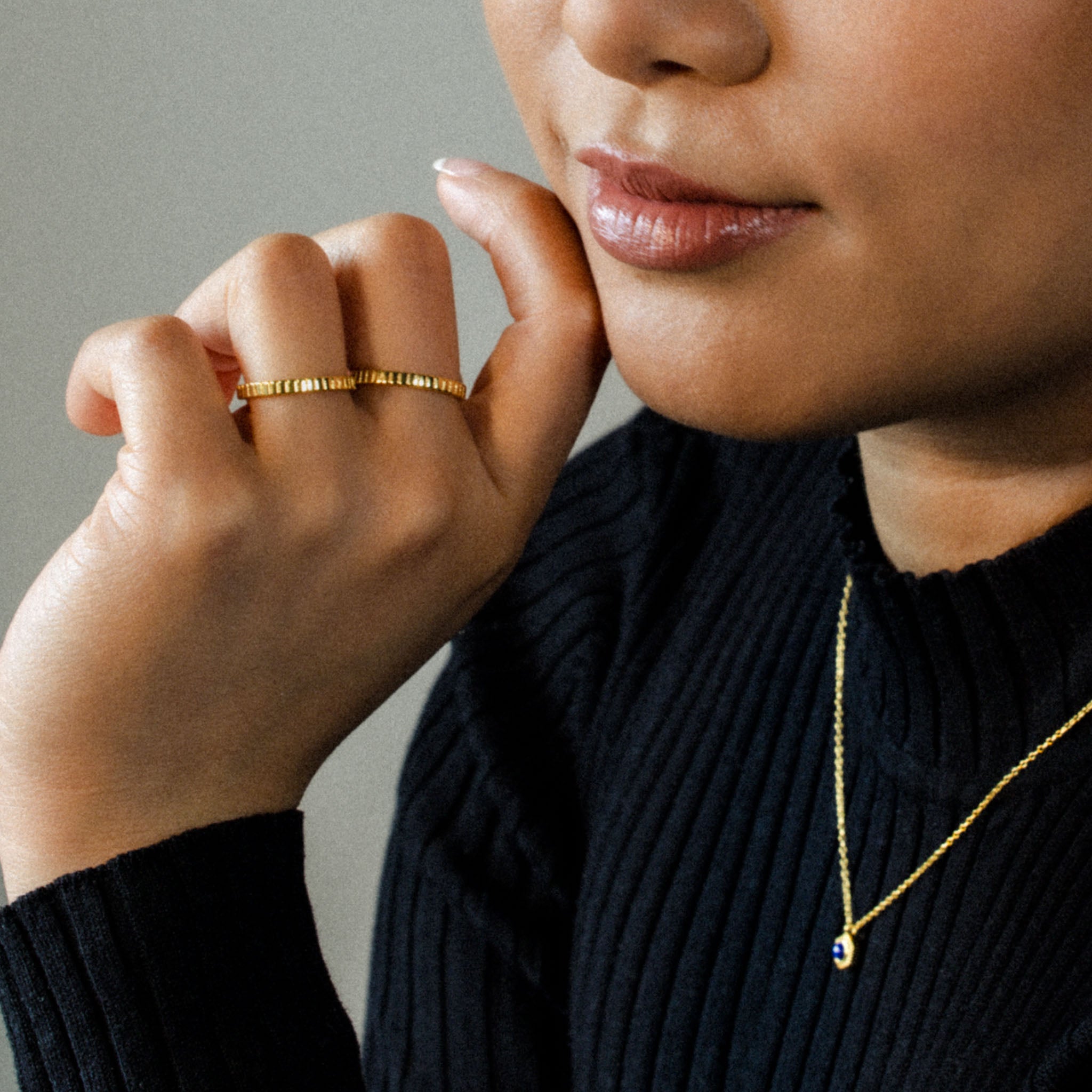 Embrace modern elegance with BY TONIN's exquisite gold stacking rings and Bel e Viv round lapis lazuli necklace, beautifully worn by Camille Malazo Dela Cruz.