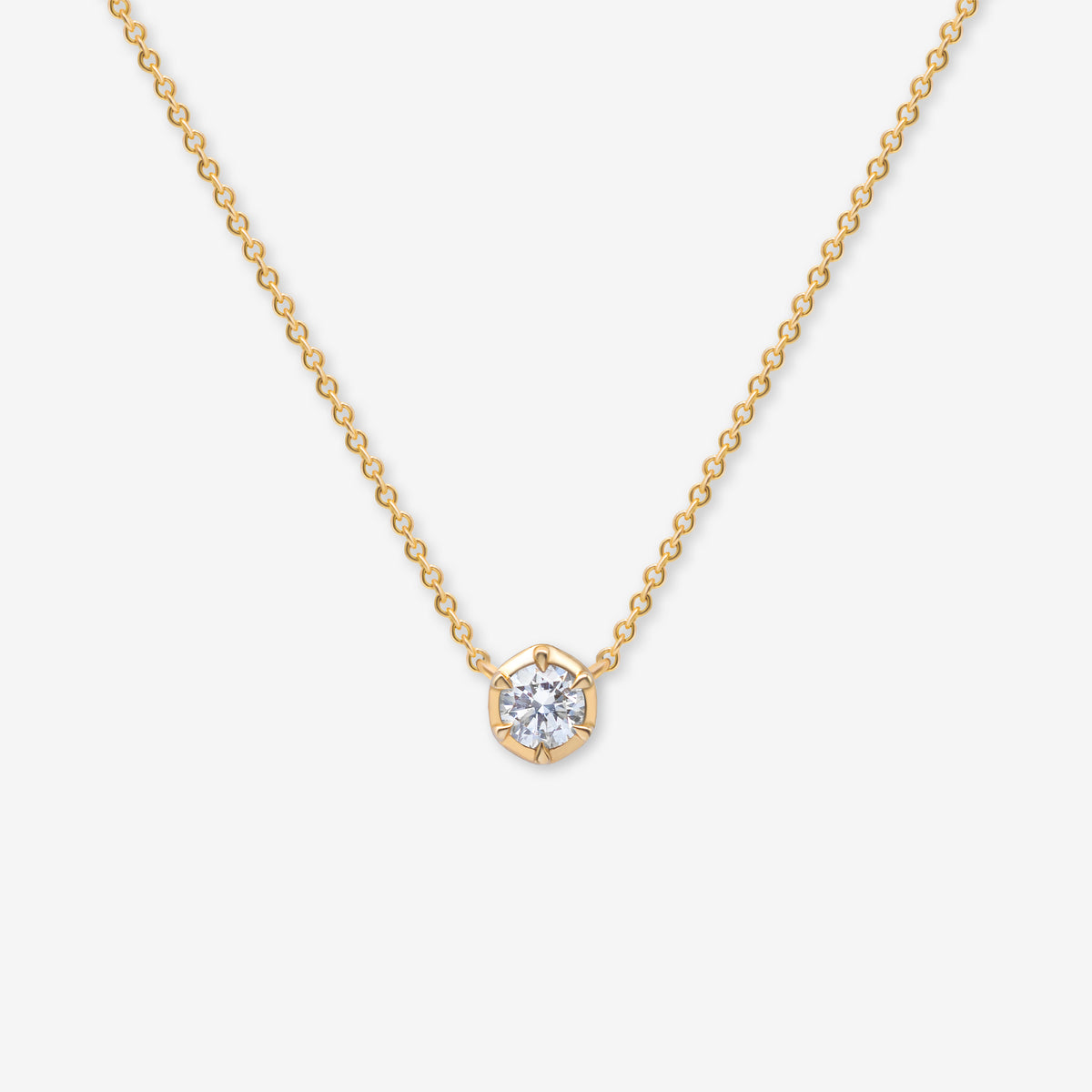 Front view of the 9K gold pendant necklace from the Essential Diamond Collection by BY TONIN, designed in NZ. Displays a brilliant-cut lab-grown diamond on a fine, minimalist gold layering chain.