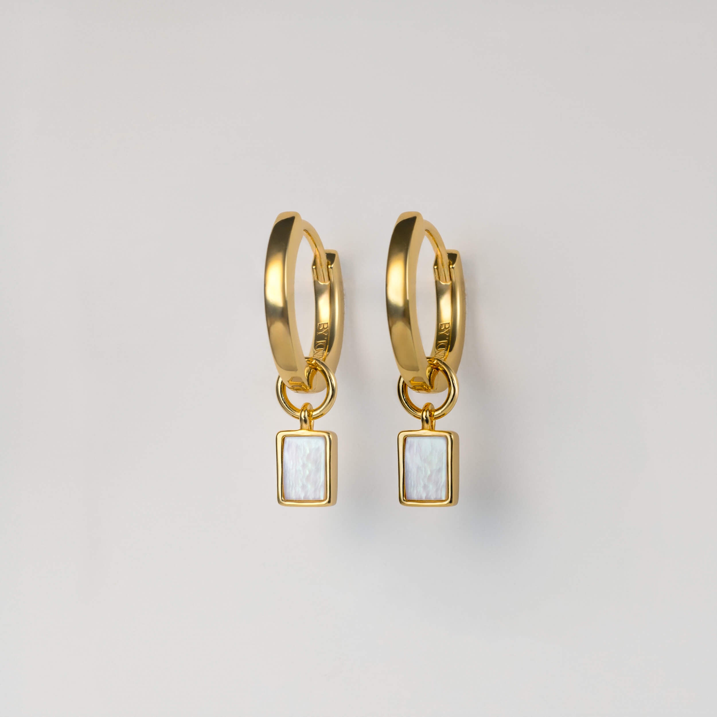 BY TONIN Heritage gold mini hoop earrings with rectangular mother of pearl charms