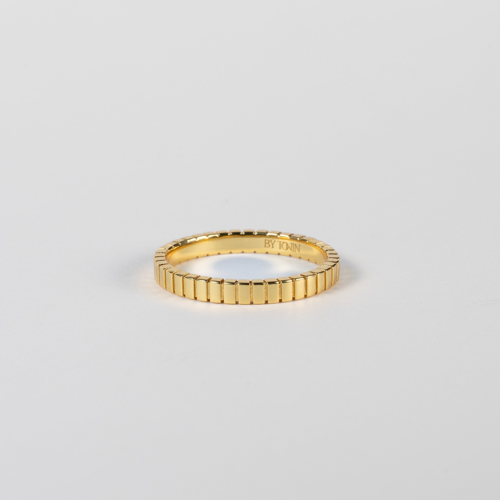 BY TONIN's Bel e Viv gold ring featuring a distinctive ridged design on a white background.