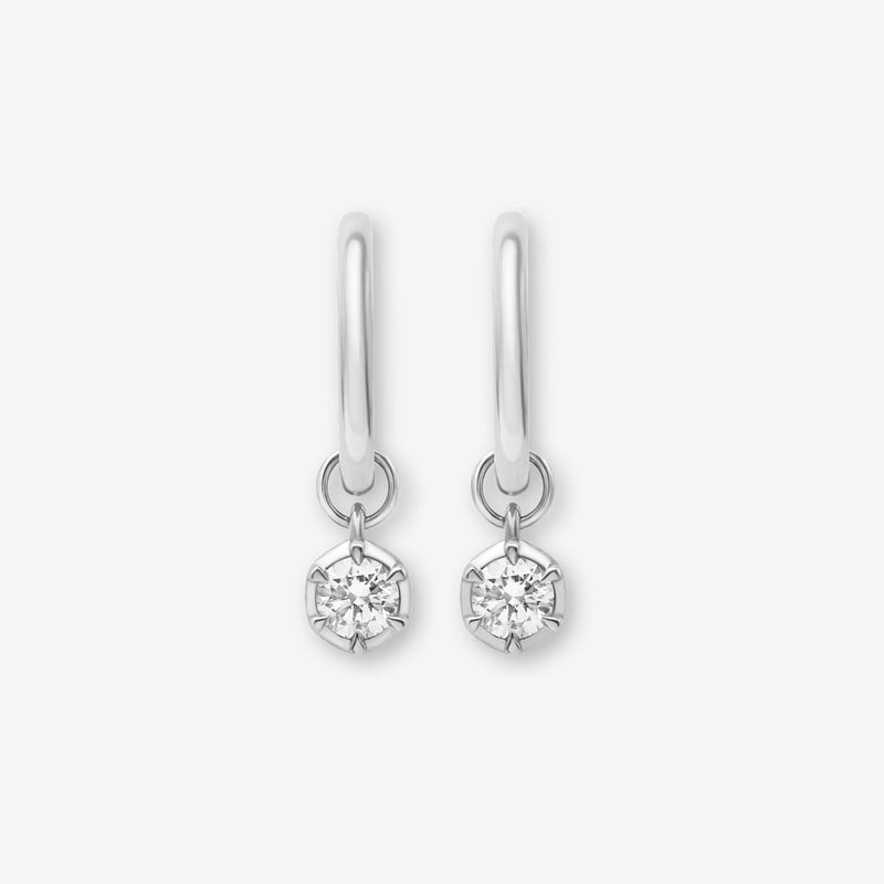 Pair of 925 sterling silver small hoop earrings featuring delicate lab-grown diamond charms from the Essential Diamond Collection by BY TONIN, designed in NZ. A hypoallergenic, modern jewellery staple.