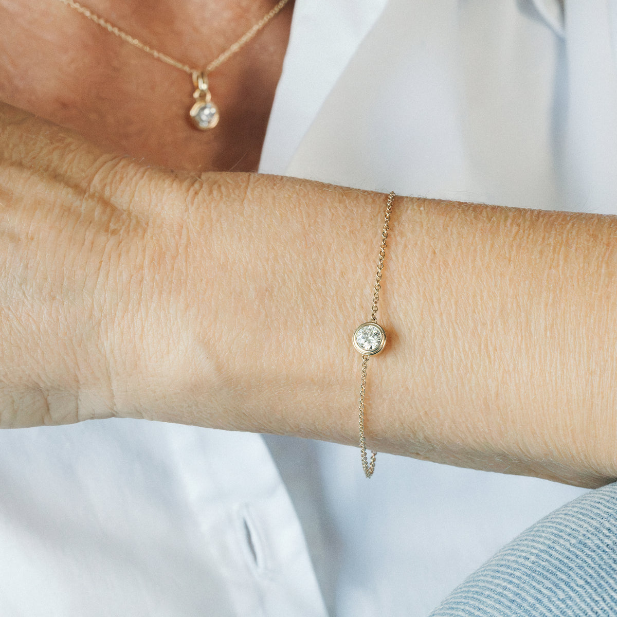 Solid gold solitaire diamond bracelet NZ: BY TONIN 0.5ct lab grown diamond chain bracelet on wrist.