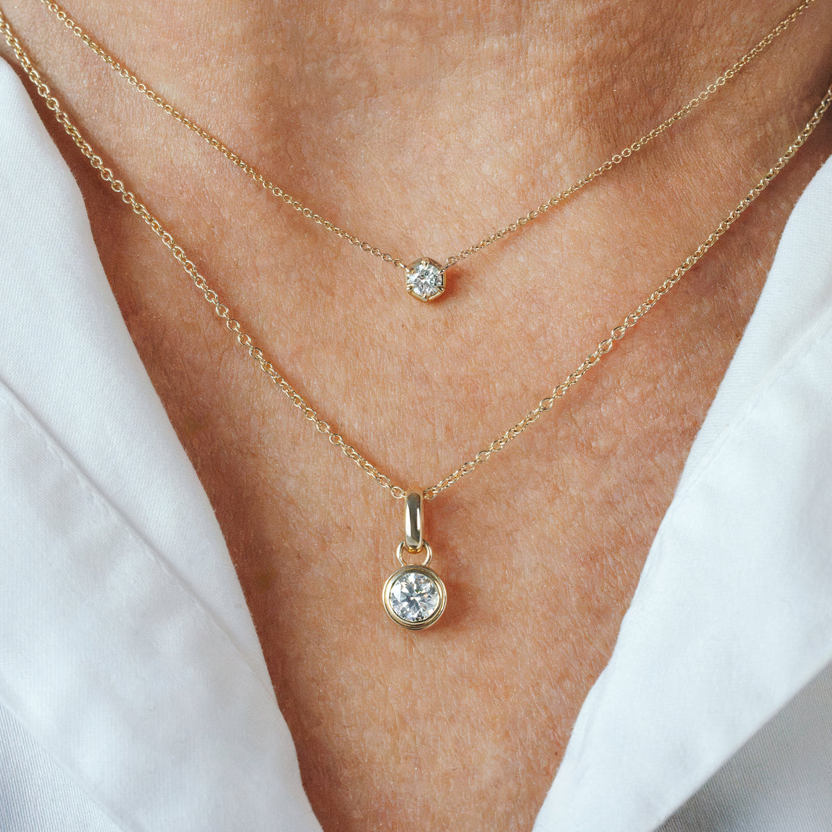 Layered gold diamond necklace stack: BY TONIN 0.5ct solitaire lab diamond pendant and fine chain necklace, New Zealand design.